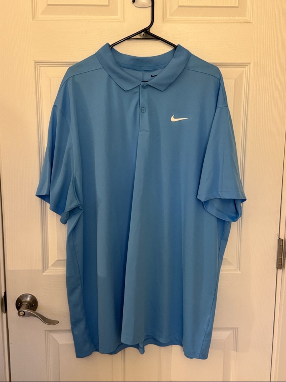 Nike Men’s Sky Blue Polo Shirt with White Swoosh